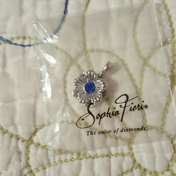 Silver and blue flower necklace charm