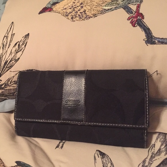 Coach checkbook wallet with "C" pattern