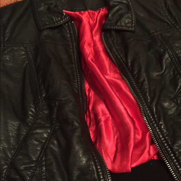 Beautiful leather jacket with red satin lining