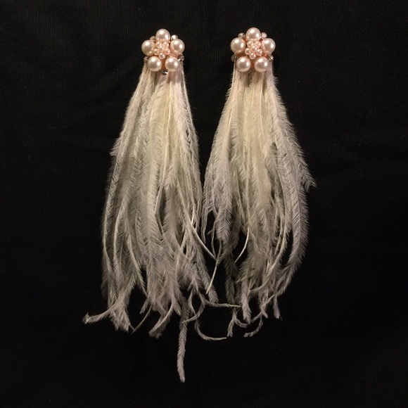 Feather earring.