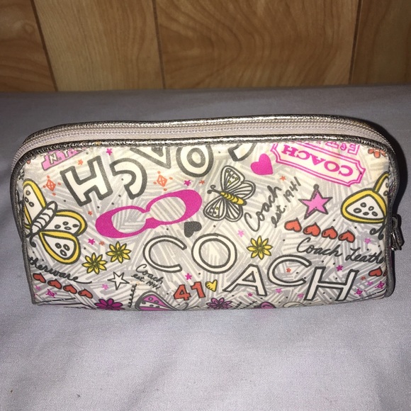 COACH poppy graffiti butterfly makeup bag.