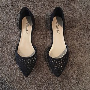 Black pointy flats