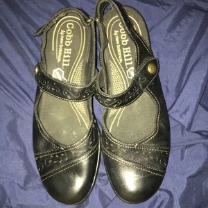 Black leather Mary Janes with open back 10W