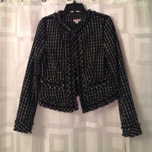 Cropped tweed jacket.