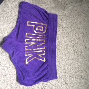 Purple Victoria secret shorts with gold writing