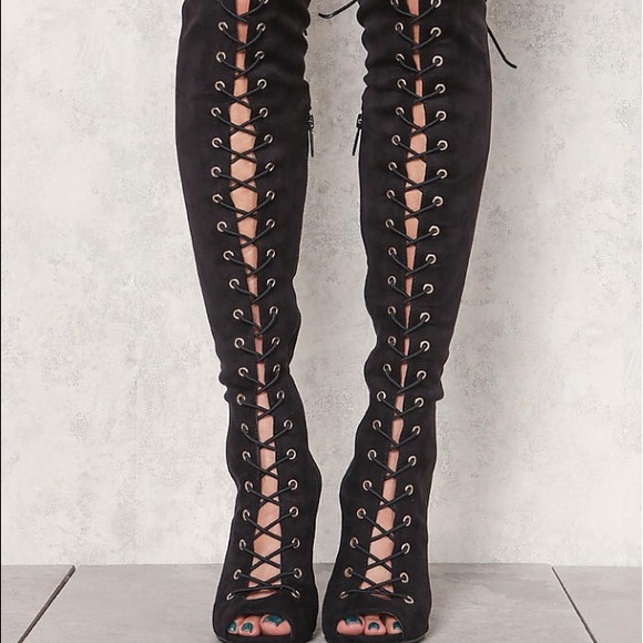 Thigh high boots / pics on request