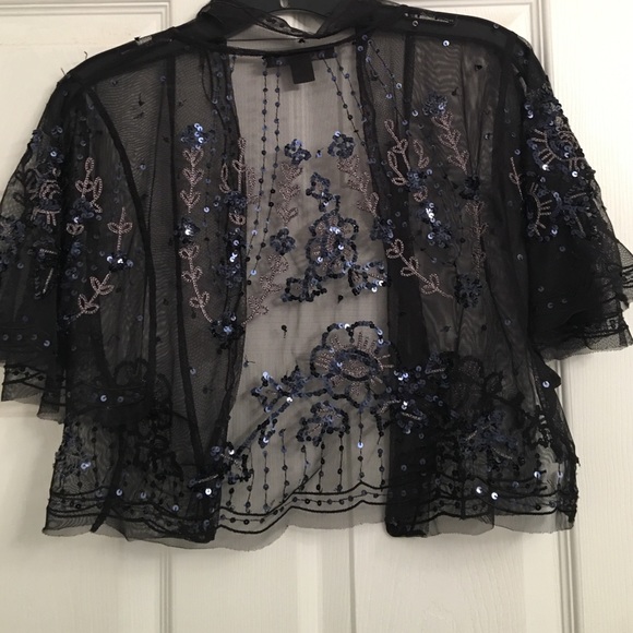 Shrug - Picture 4 of 4