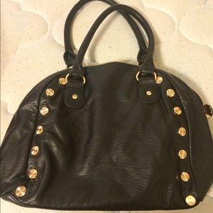 Black and gold leather bag