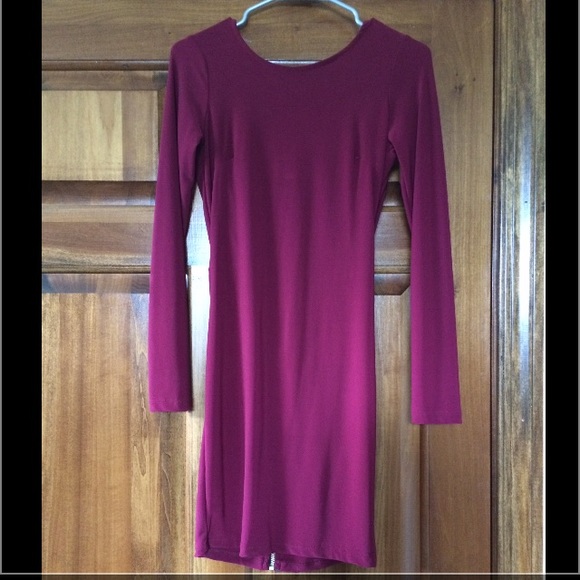 Open back maroon dress. Long sleeves. Never worn