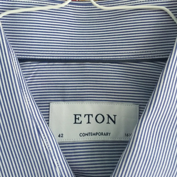 Classic thin blue stripe but town down. ETON.