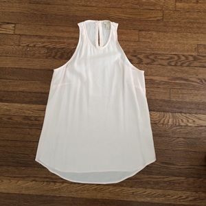 Never worn, blush colored too