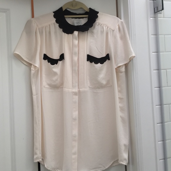 Darling cream Anthropologie top w/black details