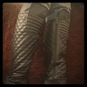 Black knee high boot with inside zip