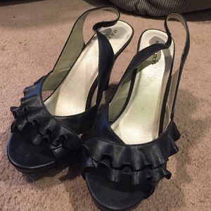 Never worn black ruffle heels
