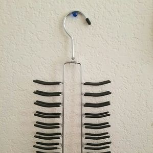 Belt/scarf/tie holder. Free with purchase.