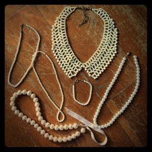 An assortment of fake pearl necklaces!