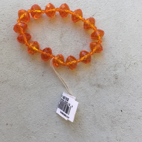 An orange bracelet/ new