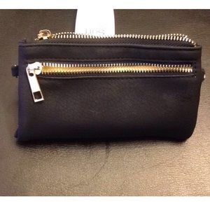 Simple black wallet, comes with gold chain strap.