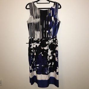 Printed sleeveless knee length dress with belt