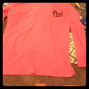 This is a pink long sleeve has 1 very small stain.