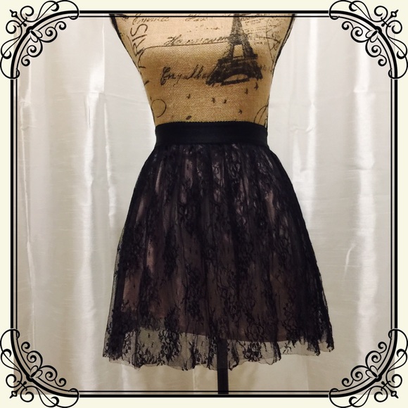 Garage Dresses & Skirts - Black lace skirt by Garage