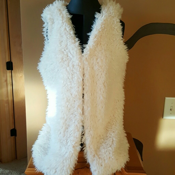 Faux Sherpa ivory vest.
