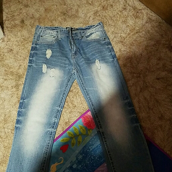 Men's distressed jeans never worn