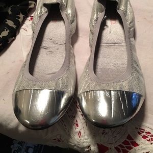 Never worn silver flats