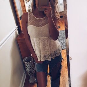 Ivory Peplum Sleeveless Top