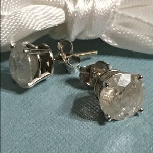 2.50 CT Diamond studs.