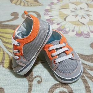 Orange and gray soft bottom infant sneakers
