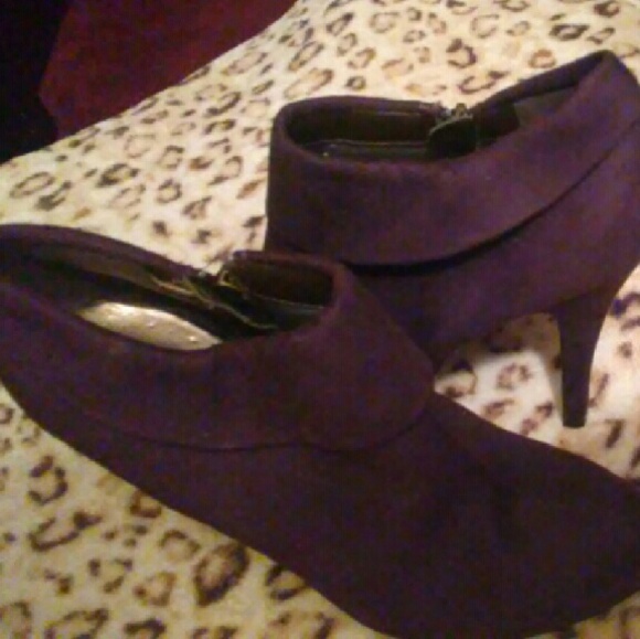 Knee high purple boots