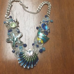A true mermaid statement necklace