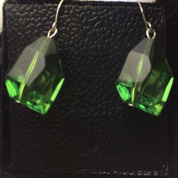 Green earrings.