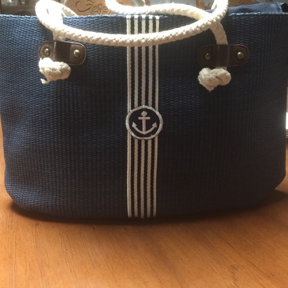 A Nautical Tote, lined, zipper top.