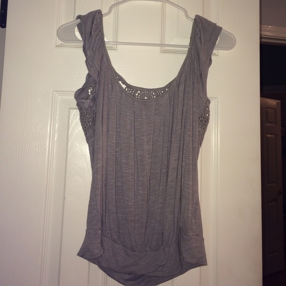Grey blouse crocheted back