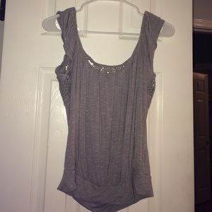 Grey blouse crocheted back