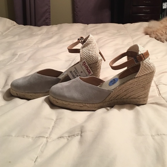 Gray and tan sandals