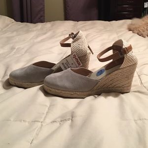 Gray and tan sandals