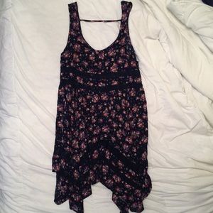 Floral print top/sundress with uneven hem.