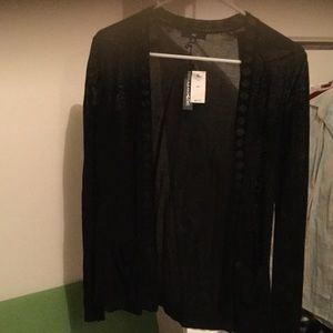 Cute black sweater!  Perfect for the evening out!