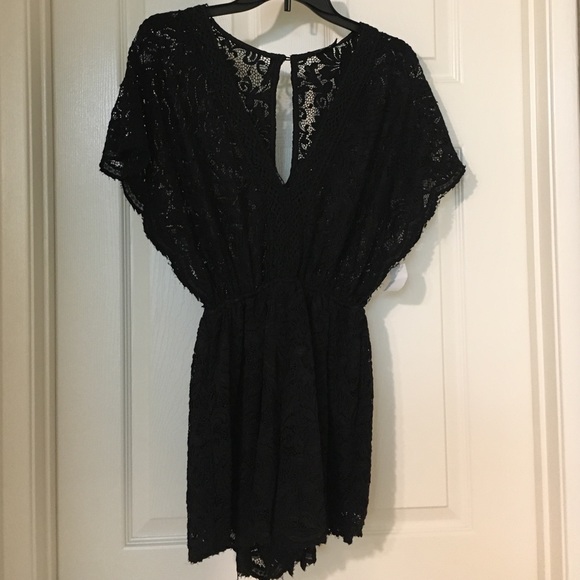 Privately Privileged. Black lace romper