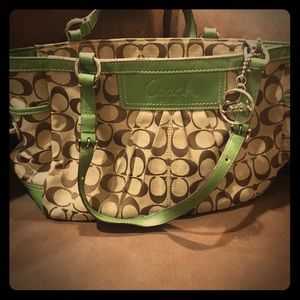 Coach brown logo & green leather handles/accents.