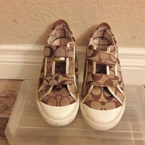 Women brown and gold shoes