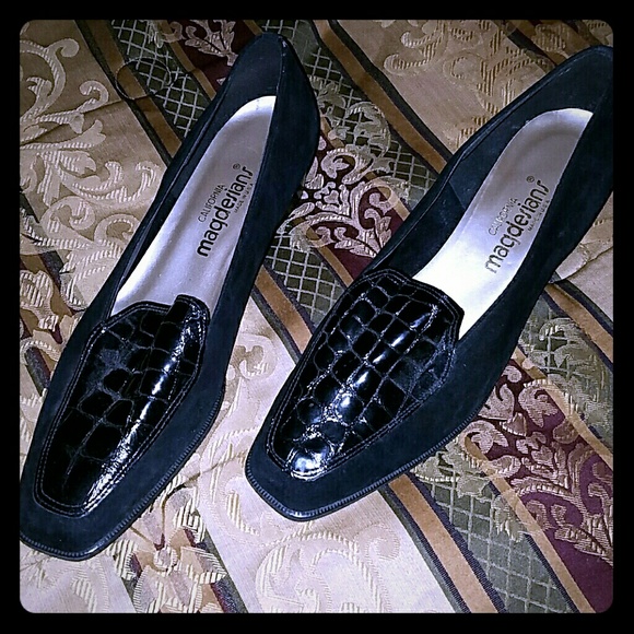 Black suede dress loafers.
