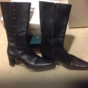 Massimo Baldi, Black leather boots.