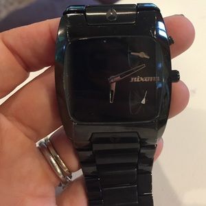 Black Nixon watch. Men's, but really can be unisex