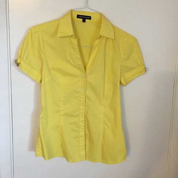 Express. Yellow shirt.
