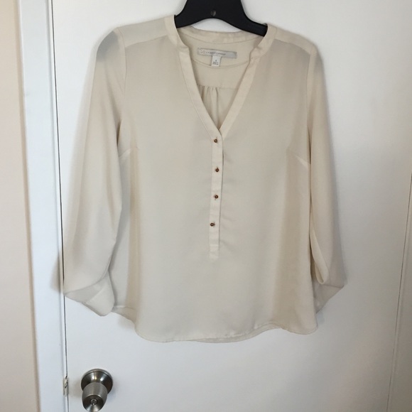 Lauren Conrad cream blouse.