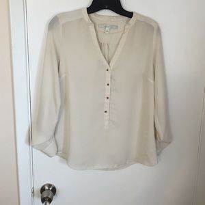 Lauren Conrad cream blouse.